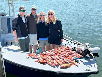 Captain guiding anglers on a personalized charter trip